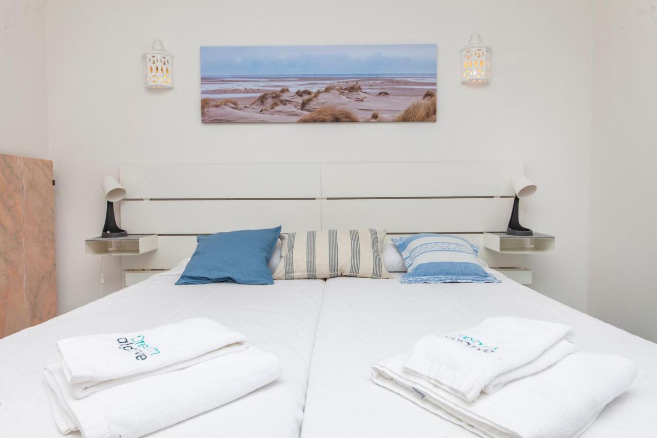 Q - Casa Do Topo Guesthouse ลากอส ห้อง รูปภาพ
