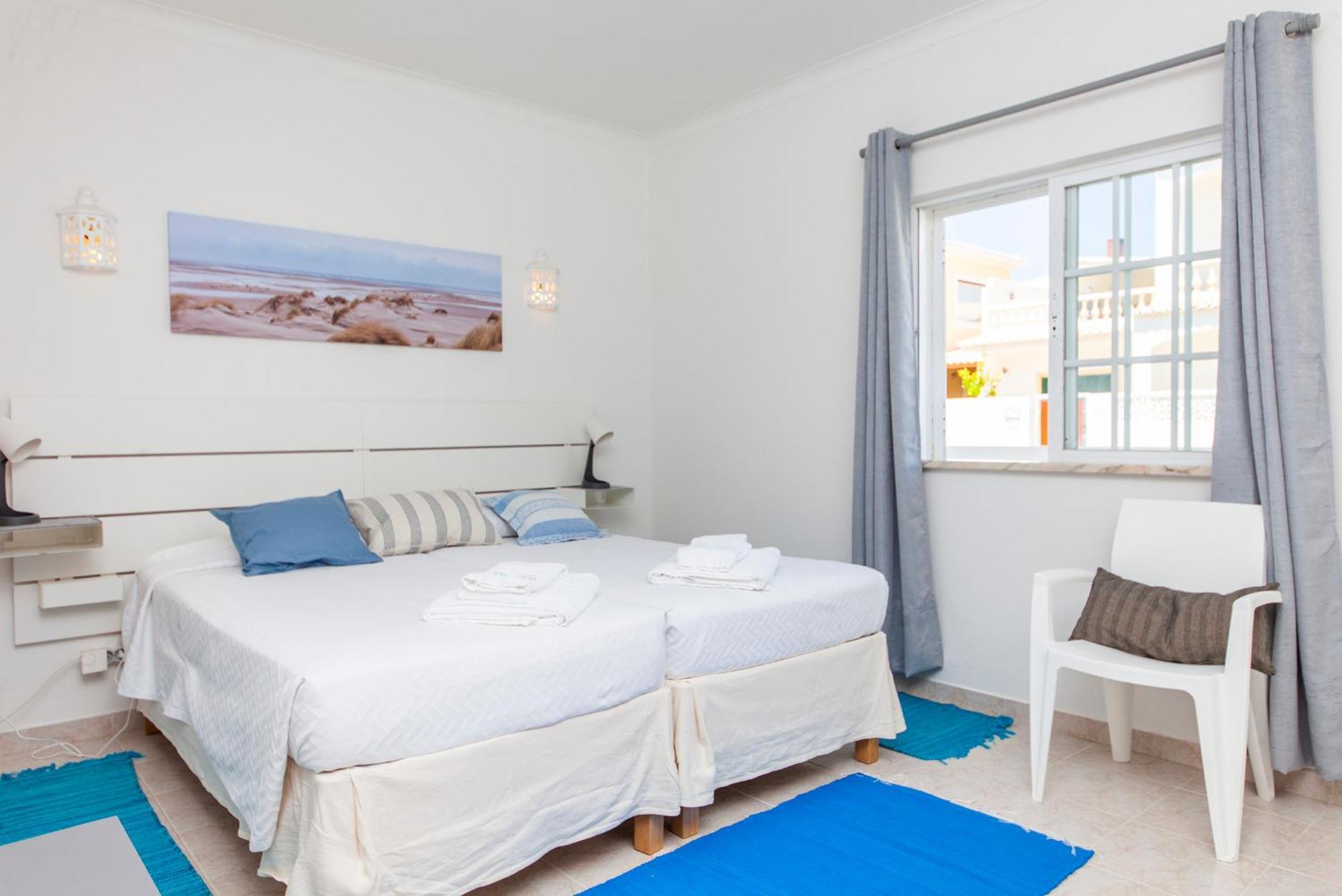 Q - Casa Do Topo Guesthouse ลากอส ห้อง รูปภาพ