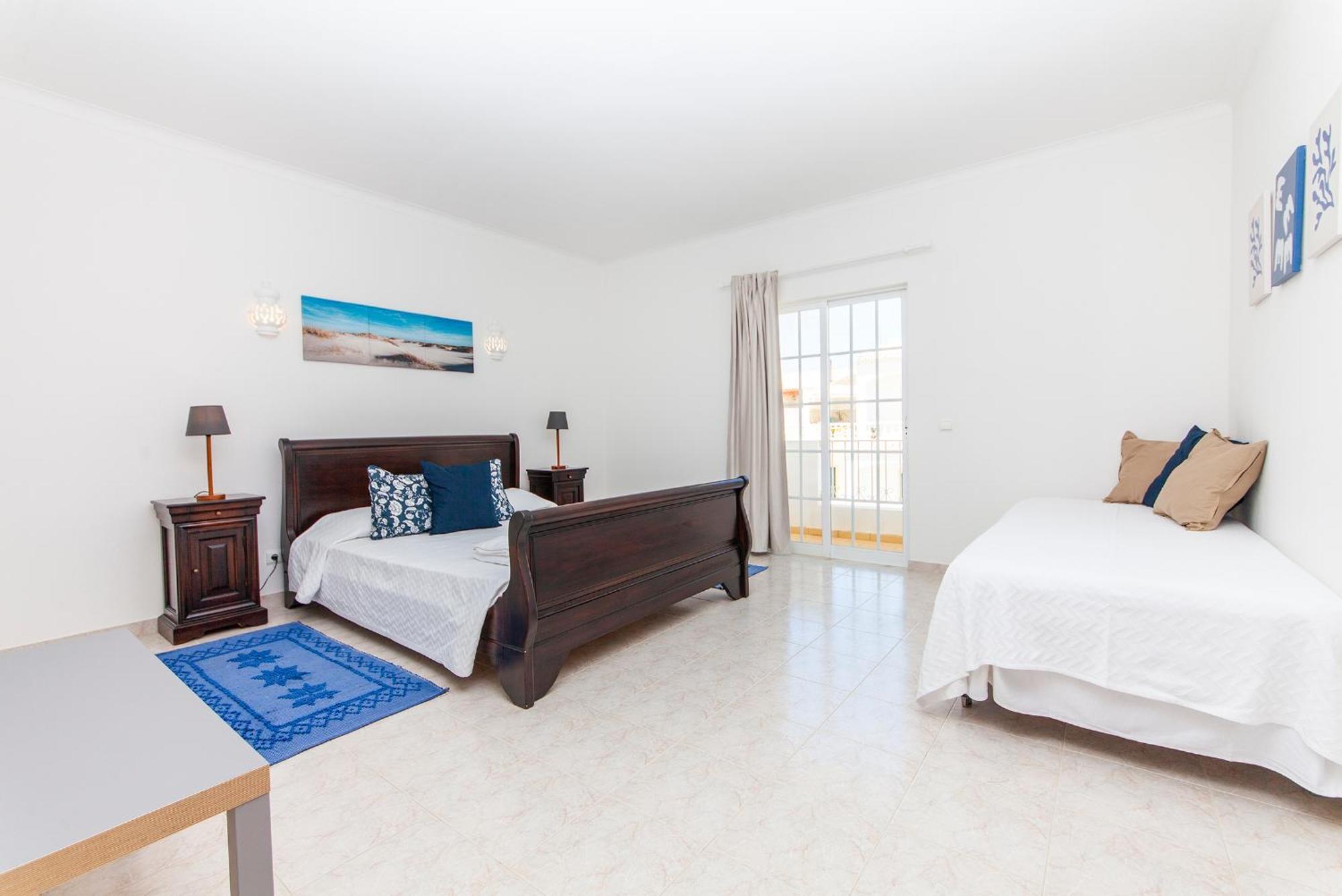 Q - Casa Do Topo Guesthouse ลากอส ห้อง รูปภาพ