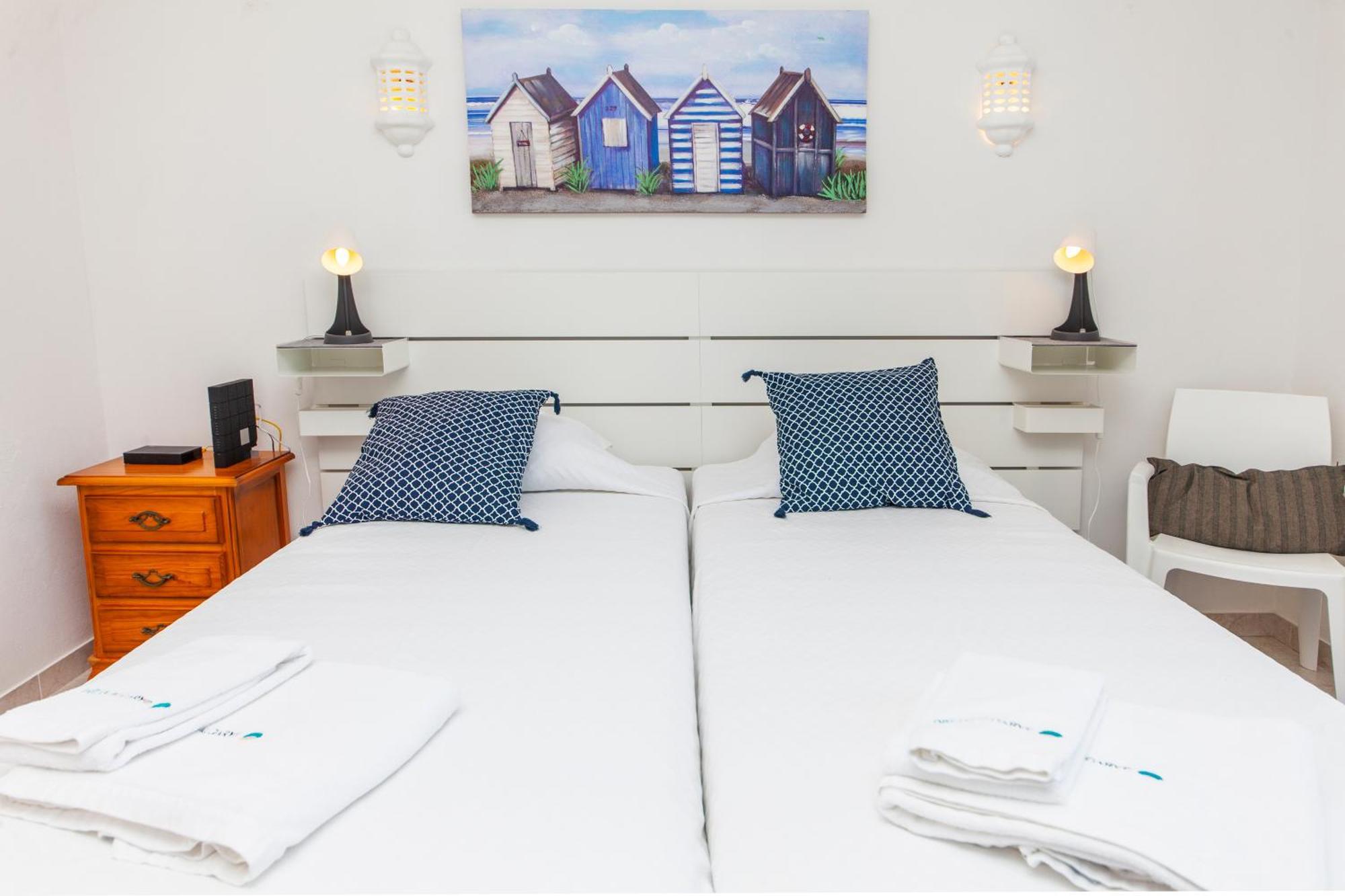 Q - Casa Do Topo Guesthouse ลากอส ห้อง รูปภาพ